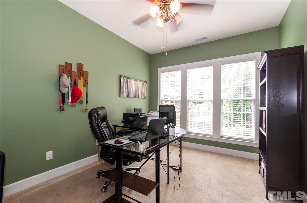 3615 Lion Ridge Court Raleigh, NC 27612 - Photo 15 of 30 a living room with furniture and a window