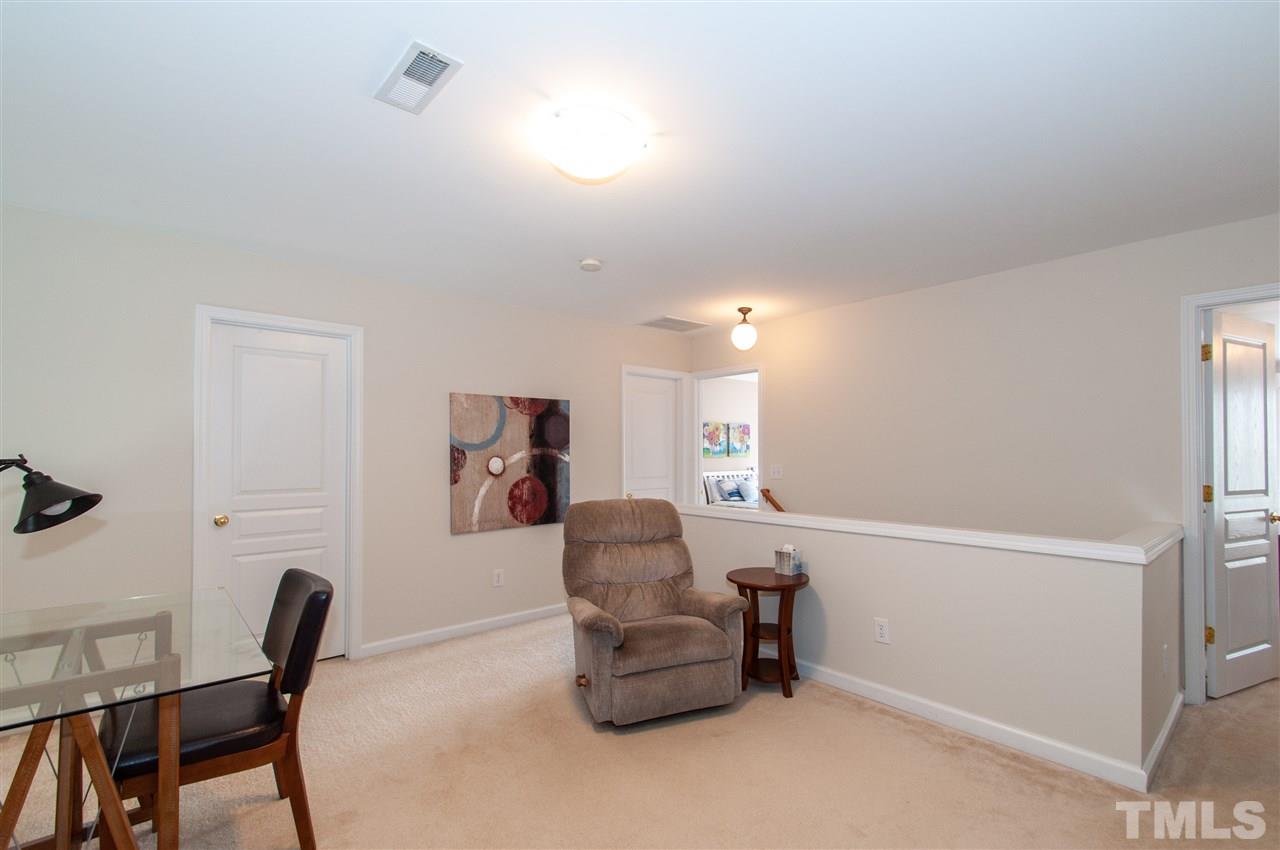 3615 Lion Ridge Court Raleigh, NC 27612 - Photo 17 of 30 a workspace with furniture and window
