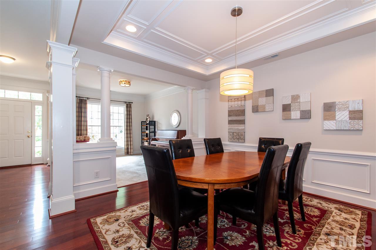 3615 Lion Ridge Court Raleigh, NC 27612 - Photo 9 of 30 a view of a dining room with furniture and wooden floor
