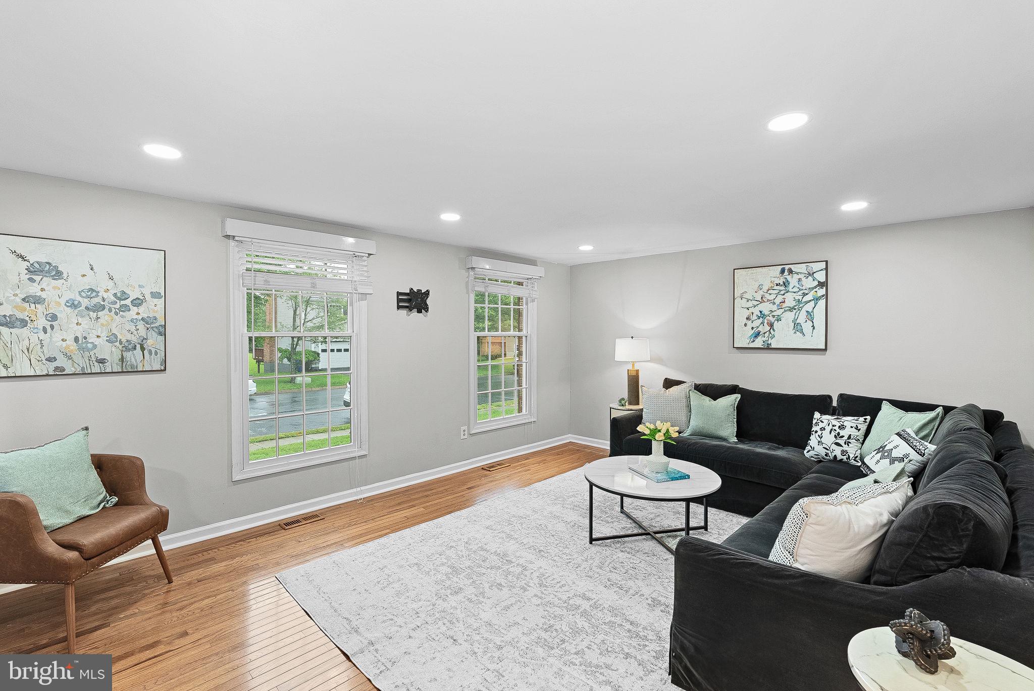 128 Applegate Drive Sterling, VA 20164 - Photo 11 of 58 a living room with furniture and a large window