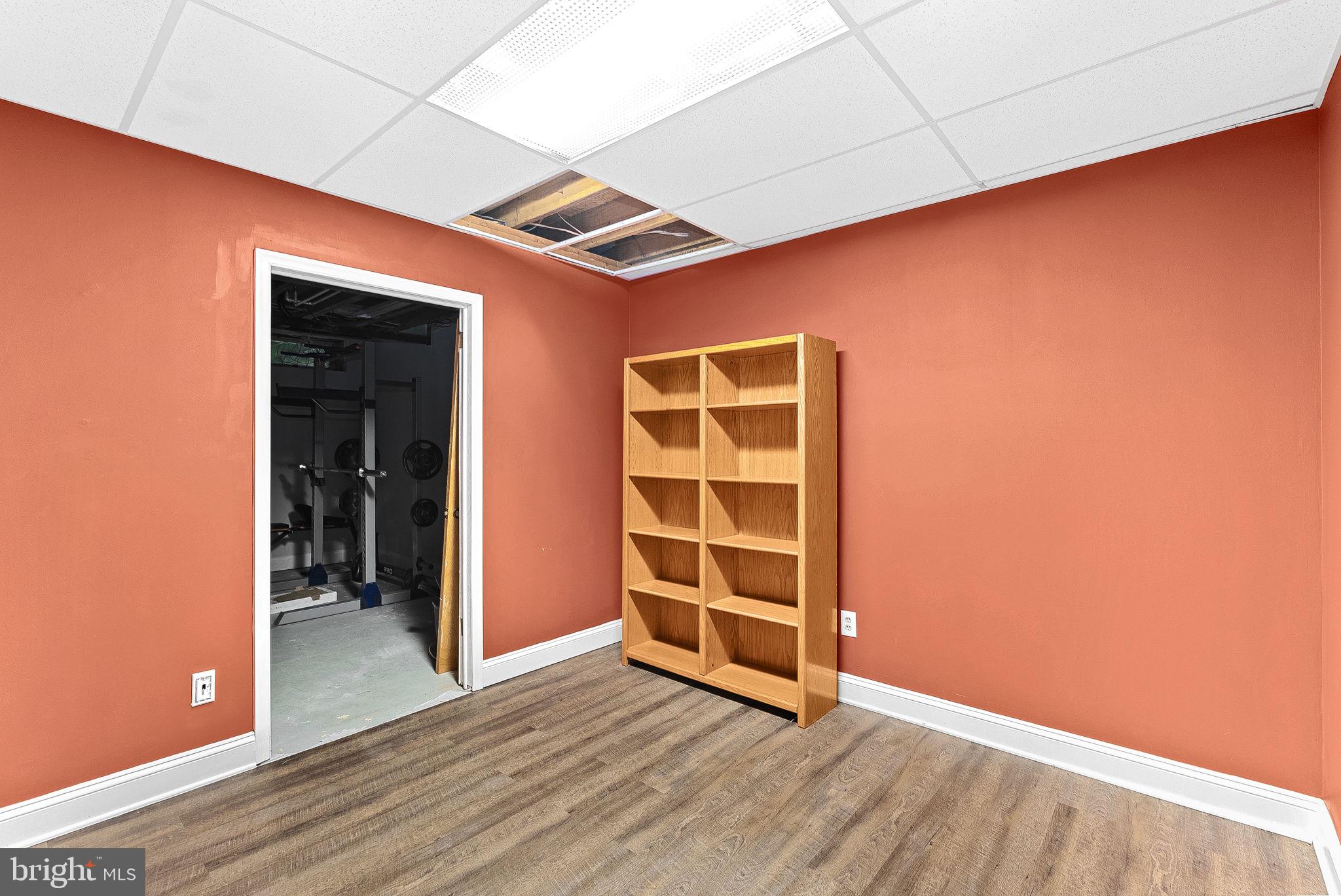 128 Applegate Drive Sterling, VA 20164 - Photo 48 of 58 an empty room with wooden floor and closet