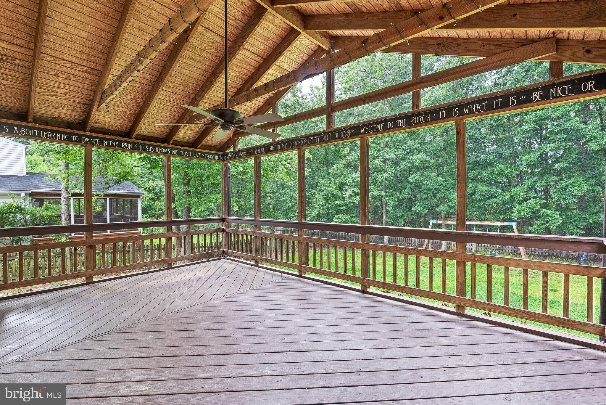 128 Applegate Drive Sterling, VA 20164 - Photo 53 of 58 a view of a balcony with wooden floor