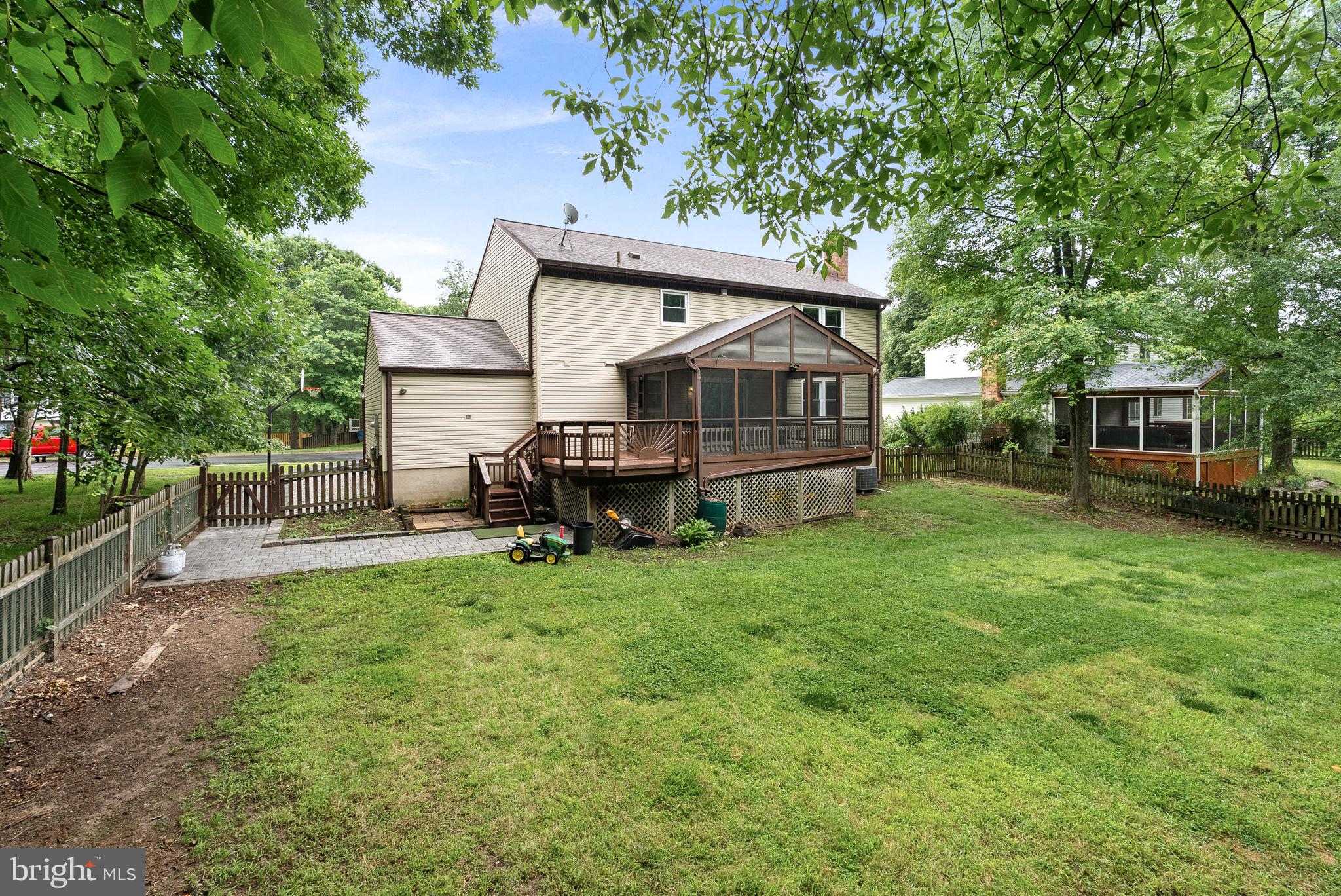 128 Applegate Drive Sterling, VA 20164 - Photo 56 of 58 a view of a house with a yard porch and sitting area