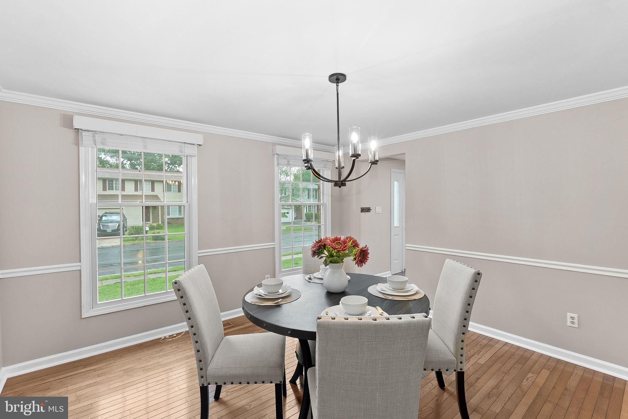 128 Applegate Drive Sterling, VA 20164 - Photo 7 of 58 a view of a dining room with furniture window and outside view