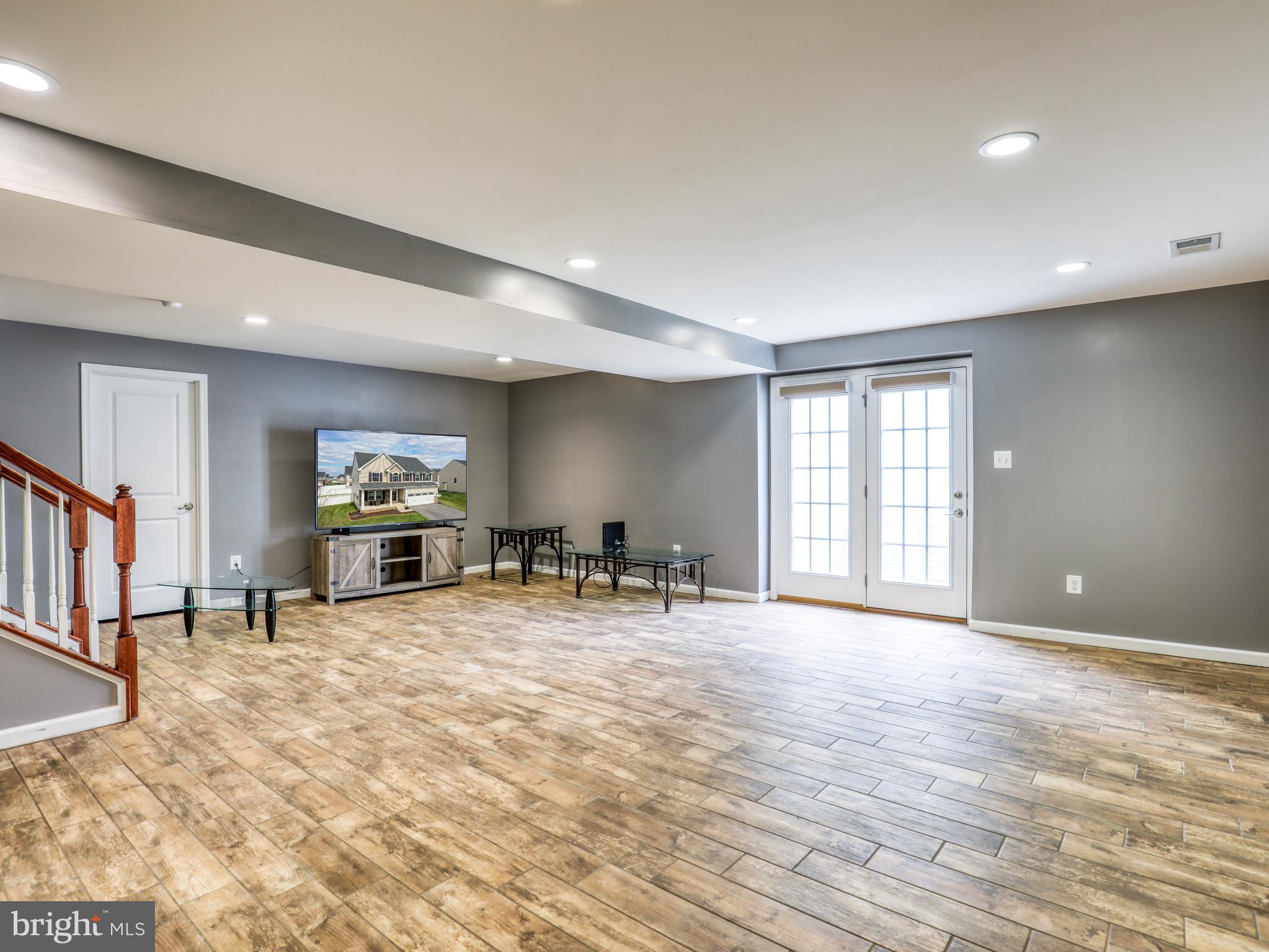 73 Overbrook Road Ranson, WV 25438 - Photo 44 of 56 Finished Basement with Tile Flooring