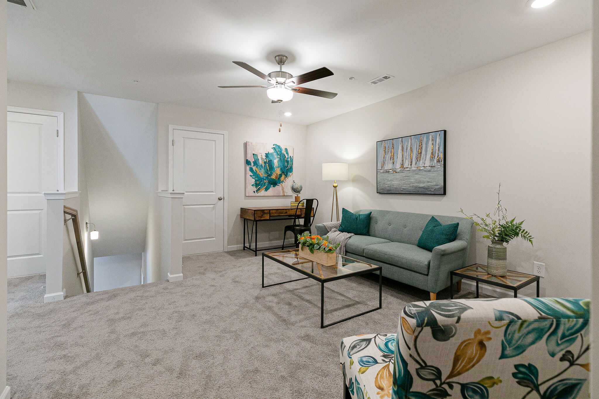 1070 June Wilde Ridge Spring Hill, TN 37174 - Photo 21 of 28 a living room with furniture and a chandelier