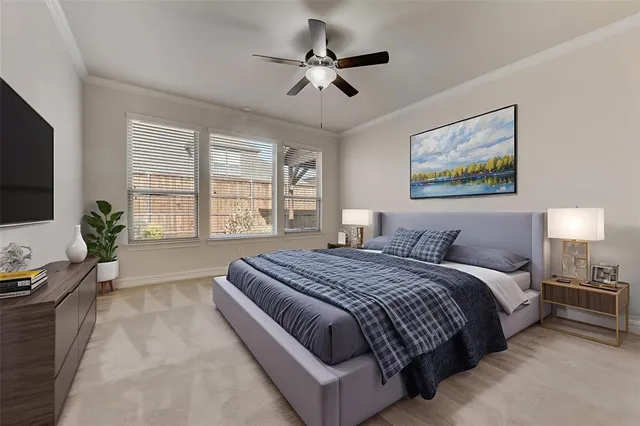 a spacious bedroom with a large bed and a chandelier