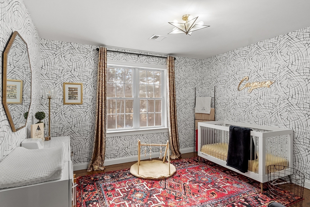 75 Chestnut Street Foxboro, MA 02035 - Photo 15 of 30 a bathroom with a granite countertop sink and a mirror