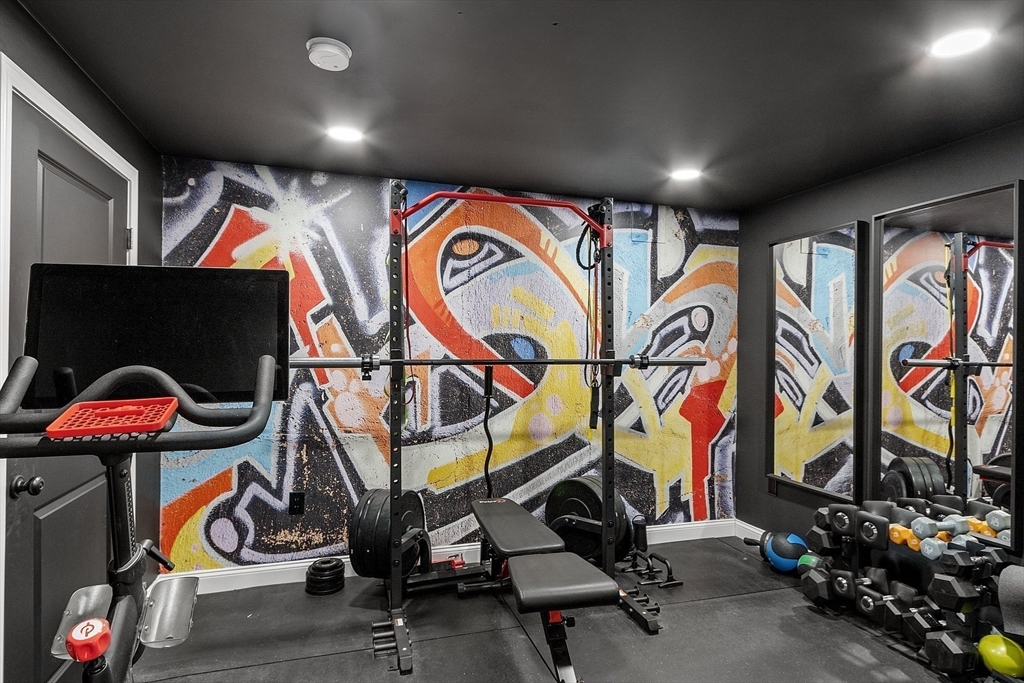 75 Chestnut Street Foxboro, MA 02035 - Photo 23 of 30 a room with lots of gym equipment