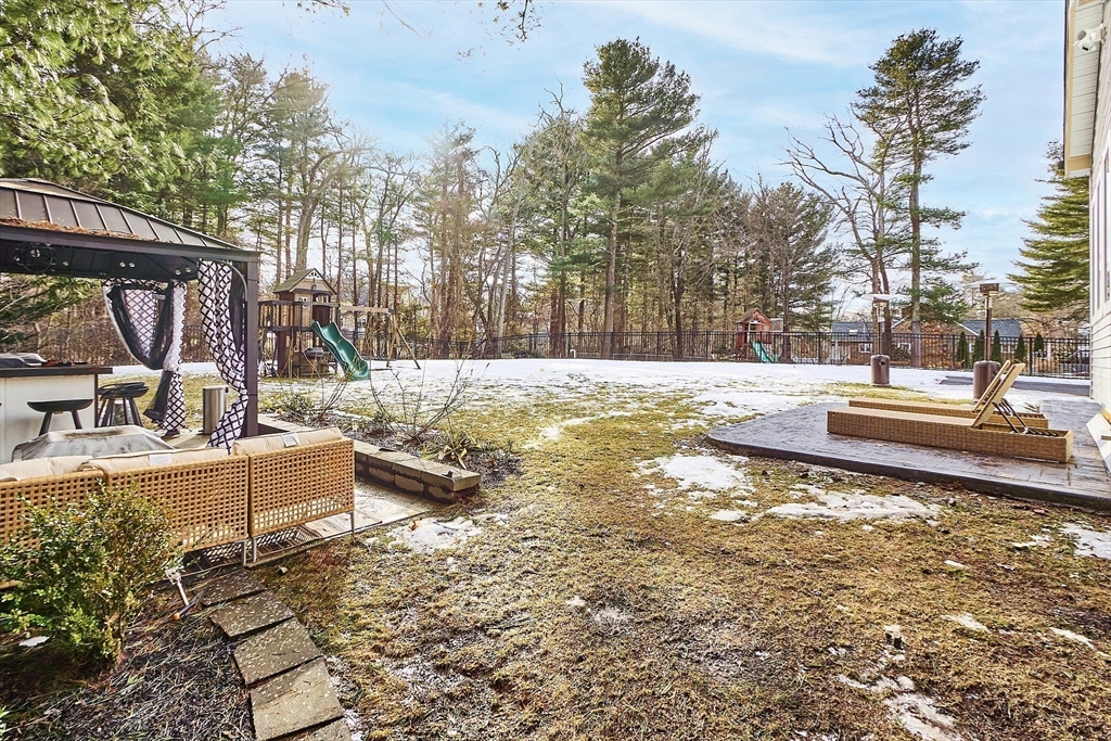 75 Chestnut Street Foxboro, MA 02035 - Photo 25 of 30 a view of a swimming pool with a patio