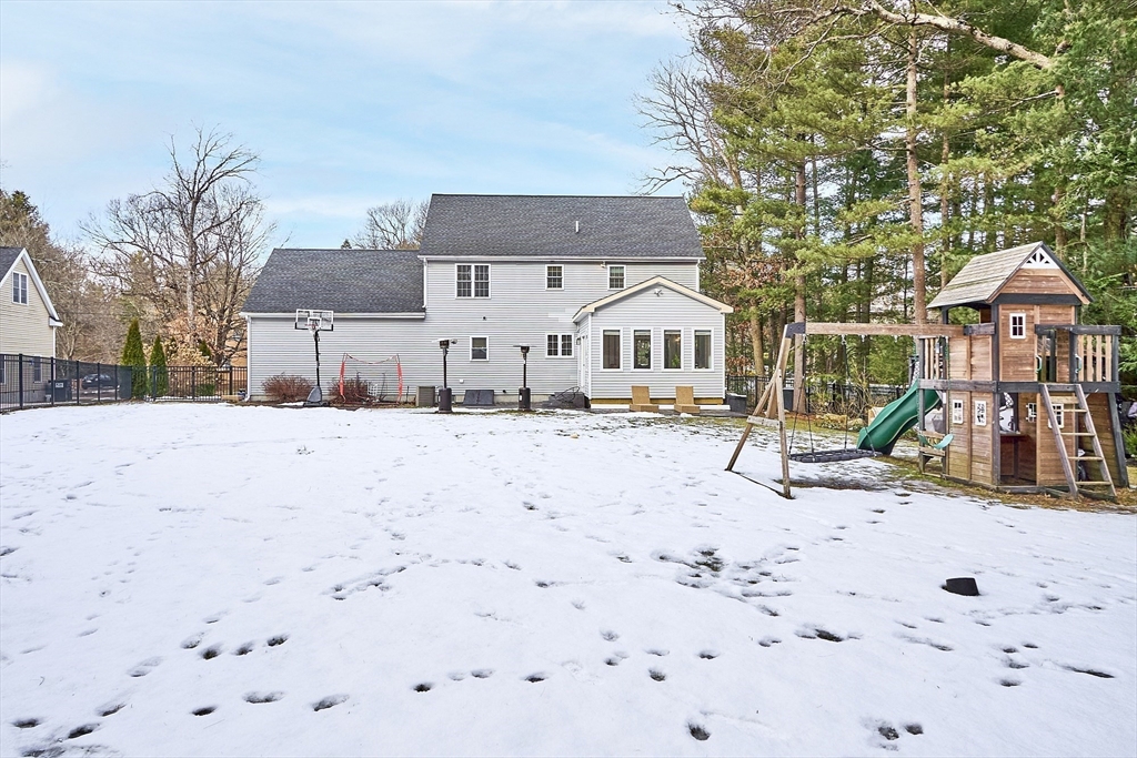 75 Chestnut Street Foxboro, MA 02035 - Photo 26 of 30 a front view of a house with a yard