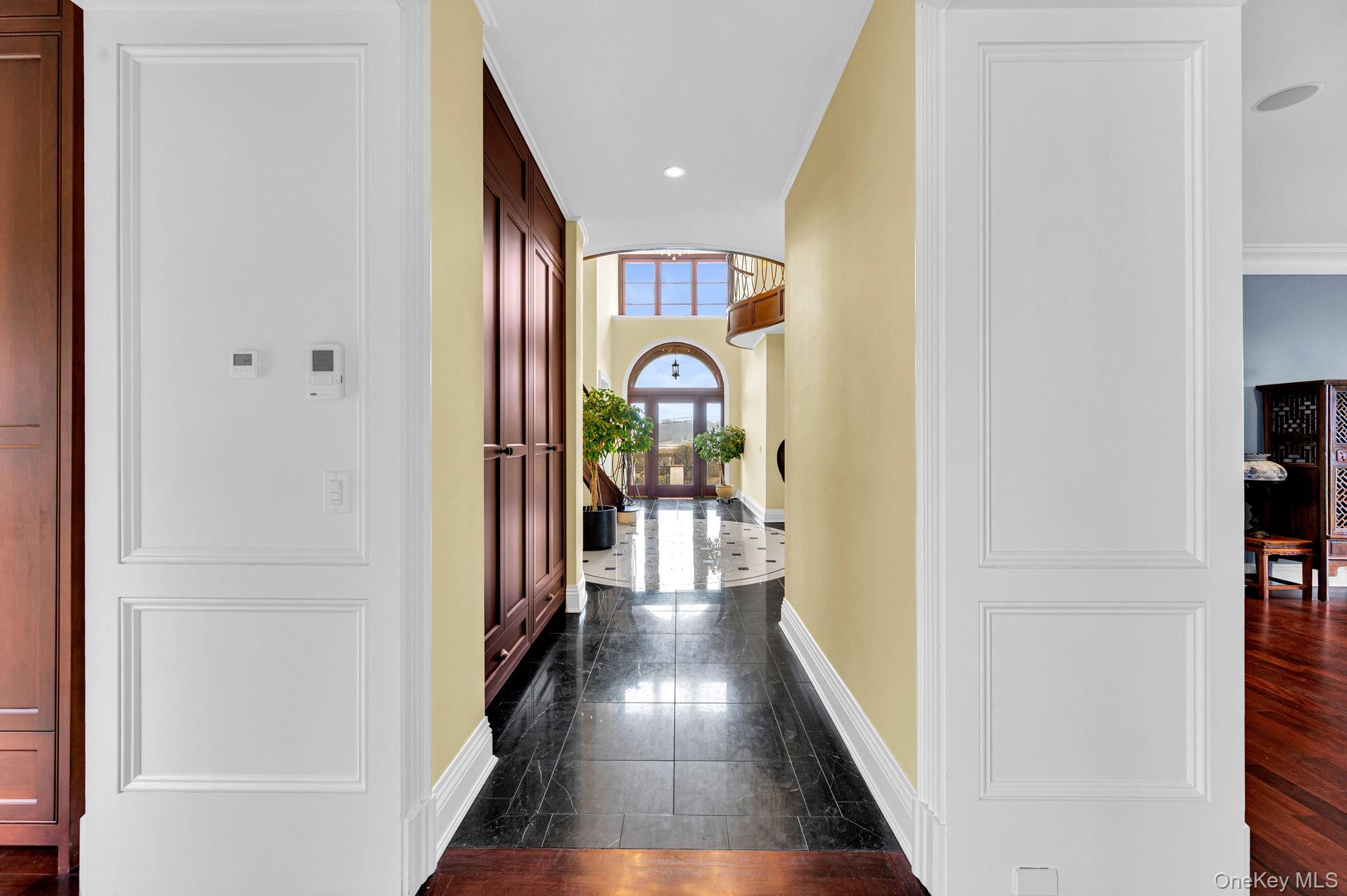 717 A Short Beach Road St. James, NY 11780 - Photo 14 of 50 Front Door View of the Hallway