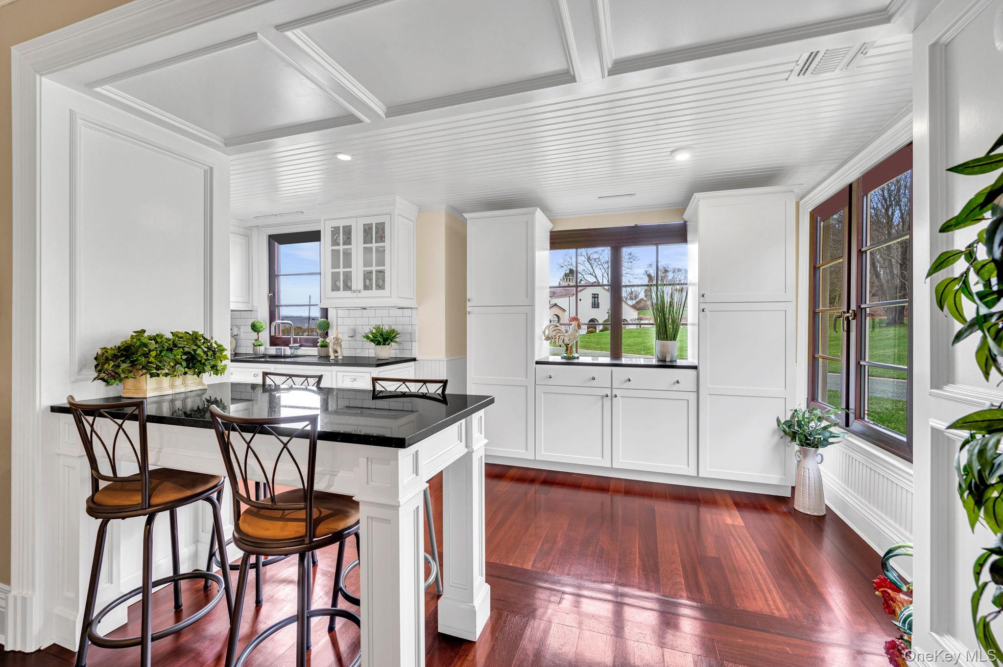 717 A Short Beach Road St. James, NY 11780 - Photo 44 of 50 a view of a dining room with furniture and wooden floor