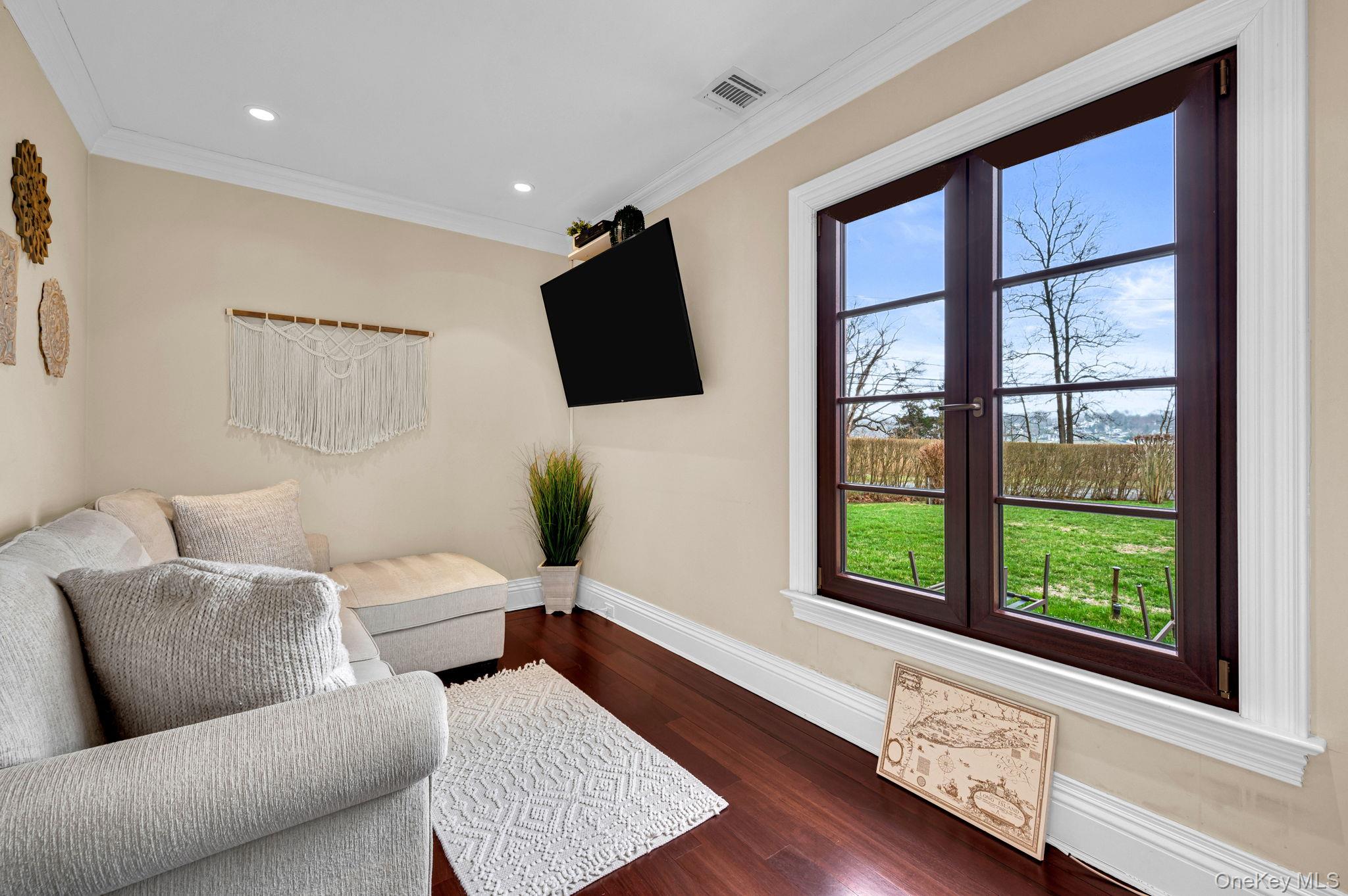 717 A Short Beach Road St. James, NY 11780 - Photo 46 of 50 a living room with furniture and a window