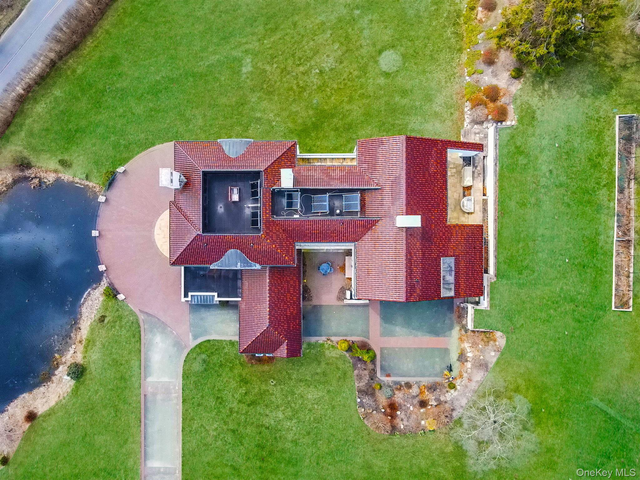 717 A Short Beach Road St. James, NY 11780 - Photo 5 of 50 Drone / Aerial View of Solar Panels for Hot Water.