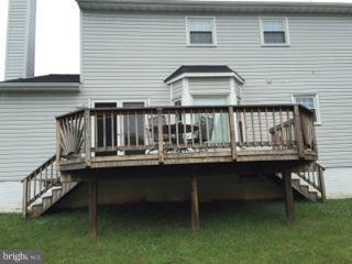 19 Markham Way Stafford, VA 22556 - Photo 18 of 23 a view of balcony with table and chairs