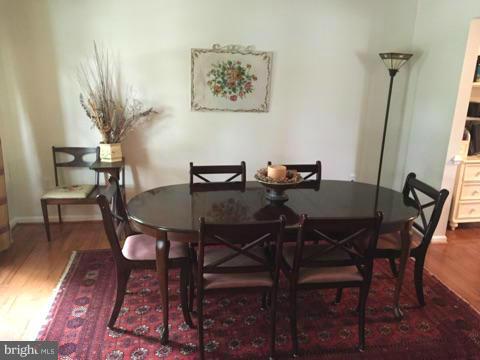 19 Markham Way Stafford, VA 22556 - Photo 3 of 23 a view of a dining room with furniture and wooden floor