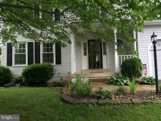 19 Markham Way Stafford, VA 22556 - Photo 21 of 23 front view of a house with a yard