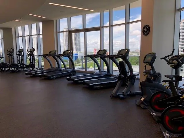 a view of a room with gym equipment