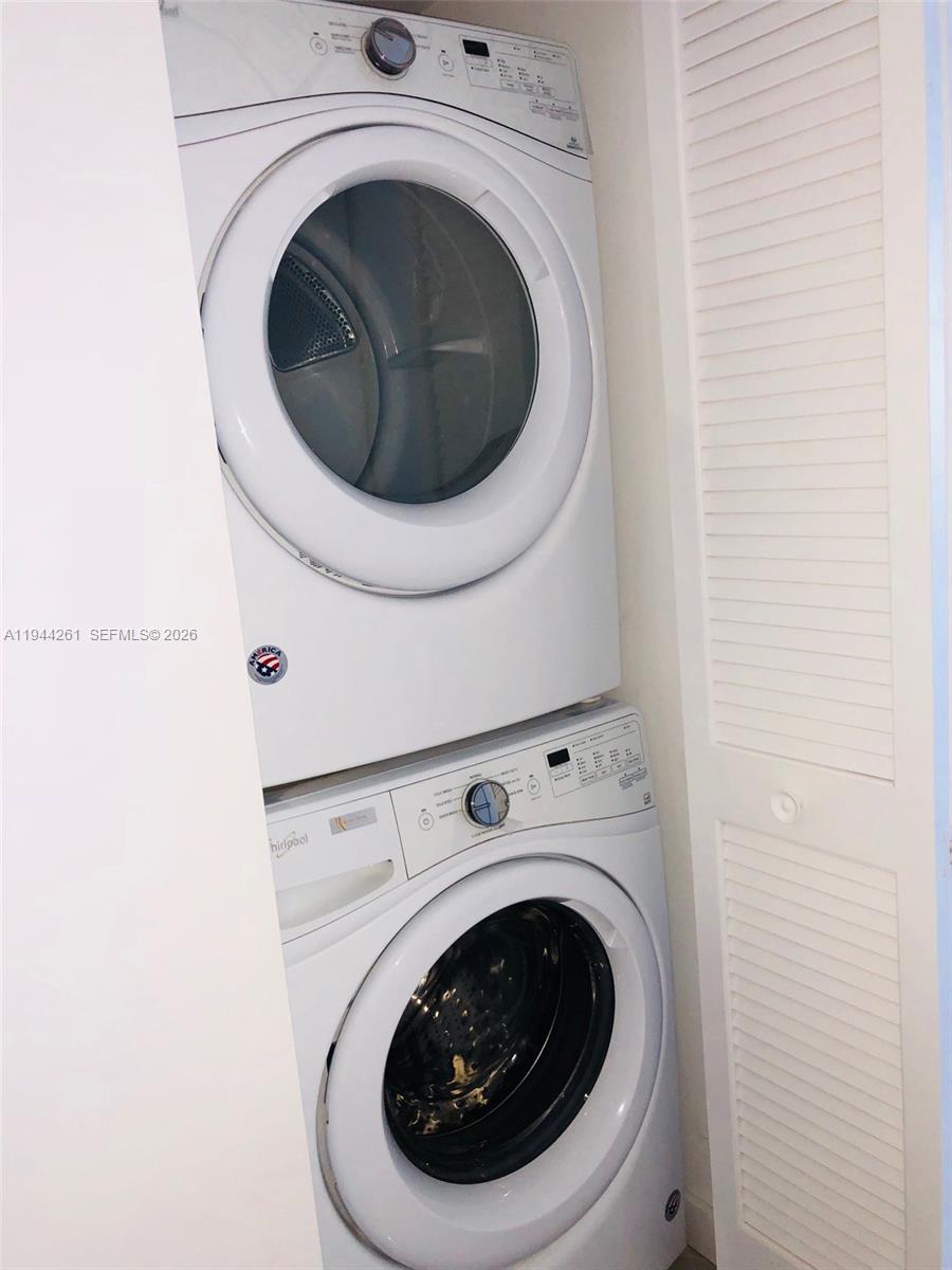 488 Northeast 18th Street, Unit 3703 Miami, FL 33132 - Photo 25 of 27 a utility room with dryer and washer
