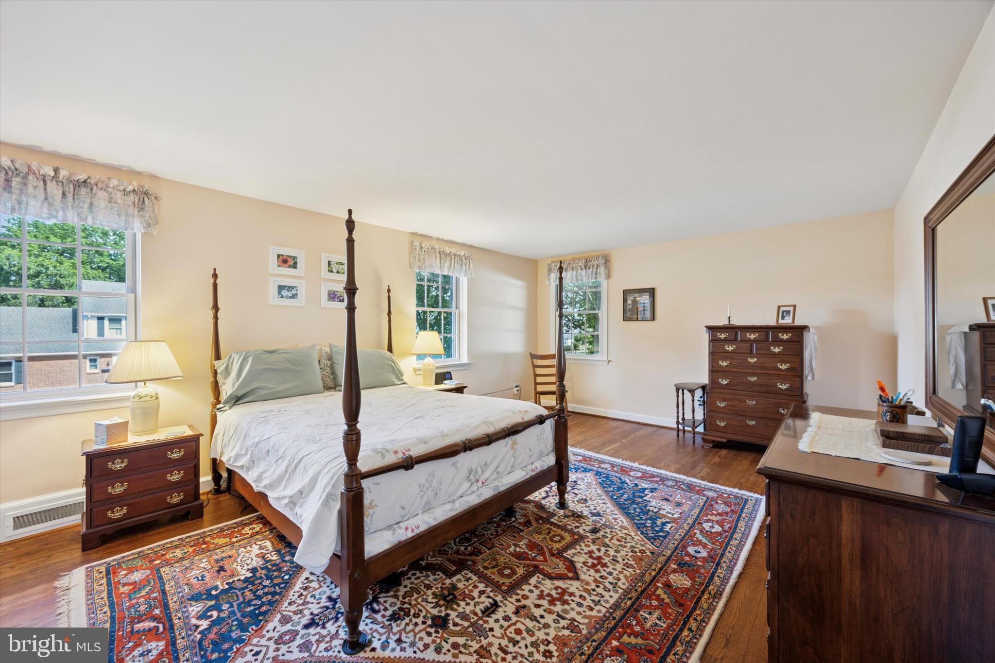 1208 Bruce Road Wilmington, DE 19803 - Photo 20 of 38 a bedroom with a bed a couch and dresser