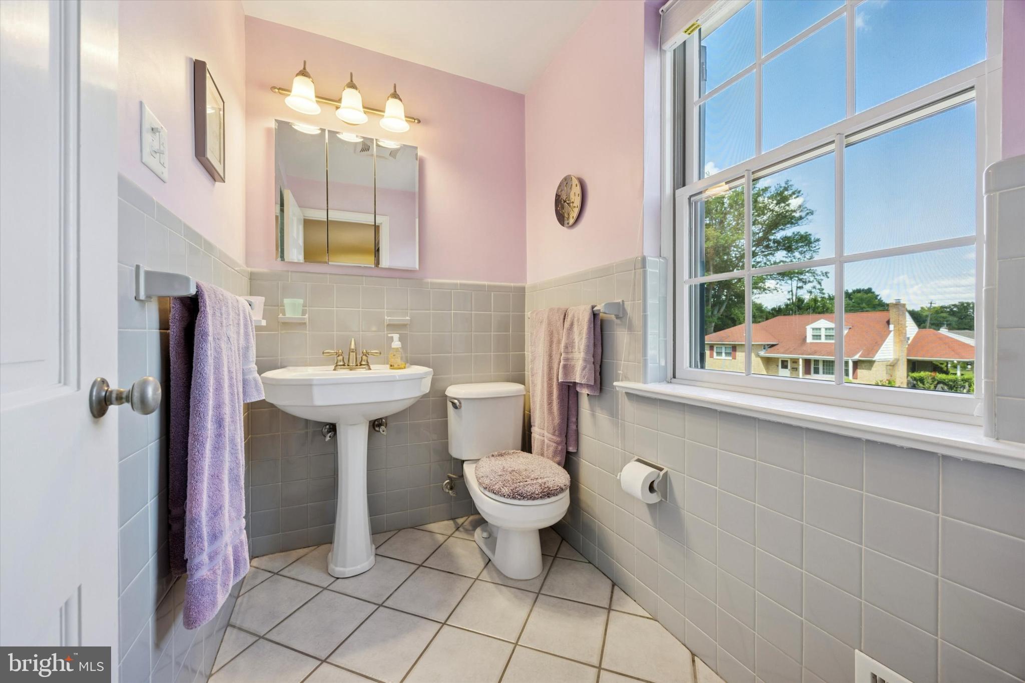 1208 Bruce Road Wilmington, DE 19803 - Photo 23 of 38 a bathroom with a sink toilet and shower