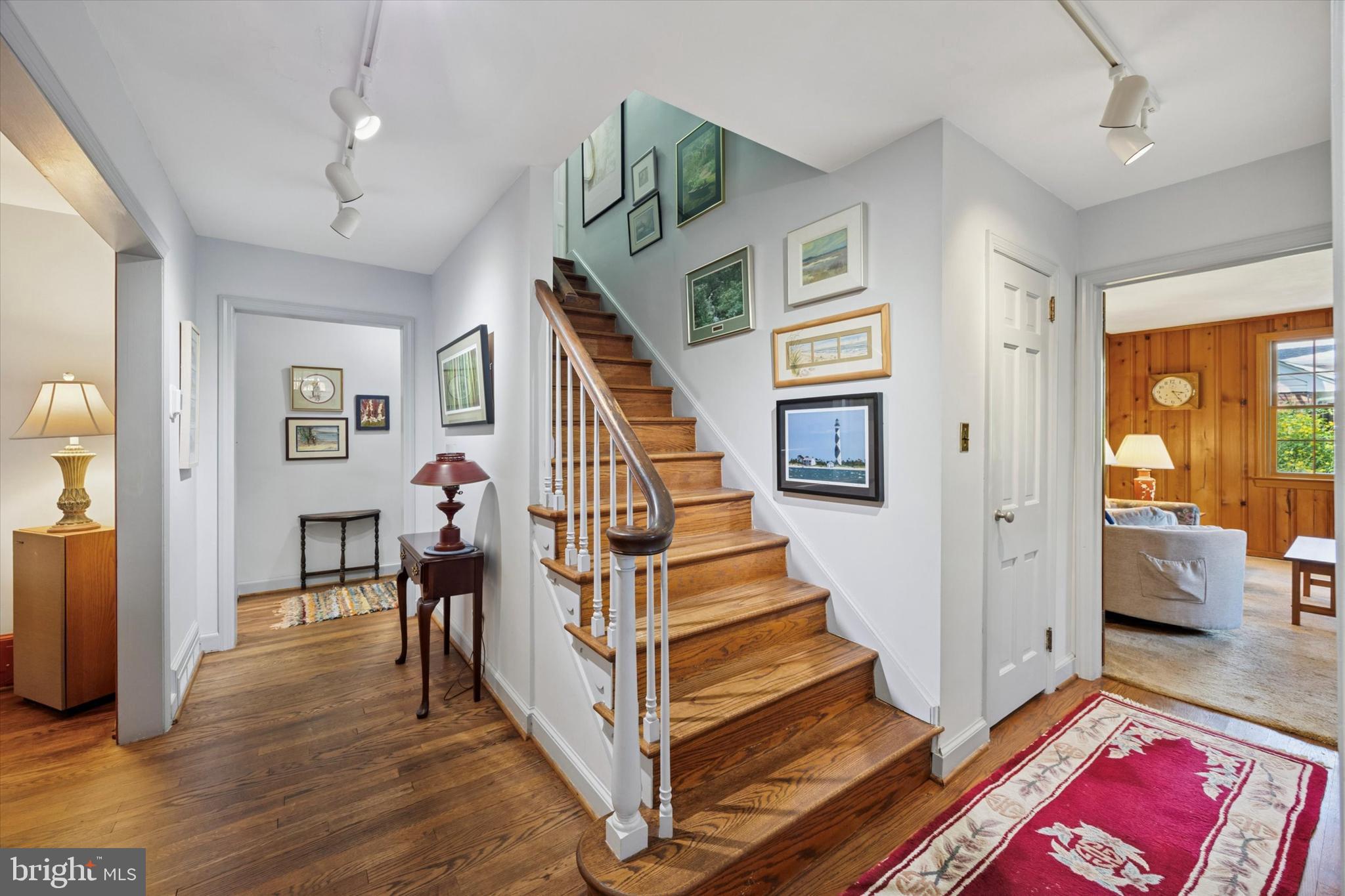1208 Bruce Road Wilmington, DE 19803 - Photo 4 of 38 a view of entryway and hall with wooden floor