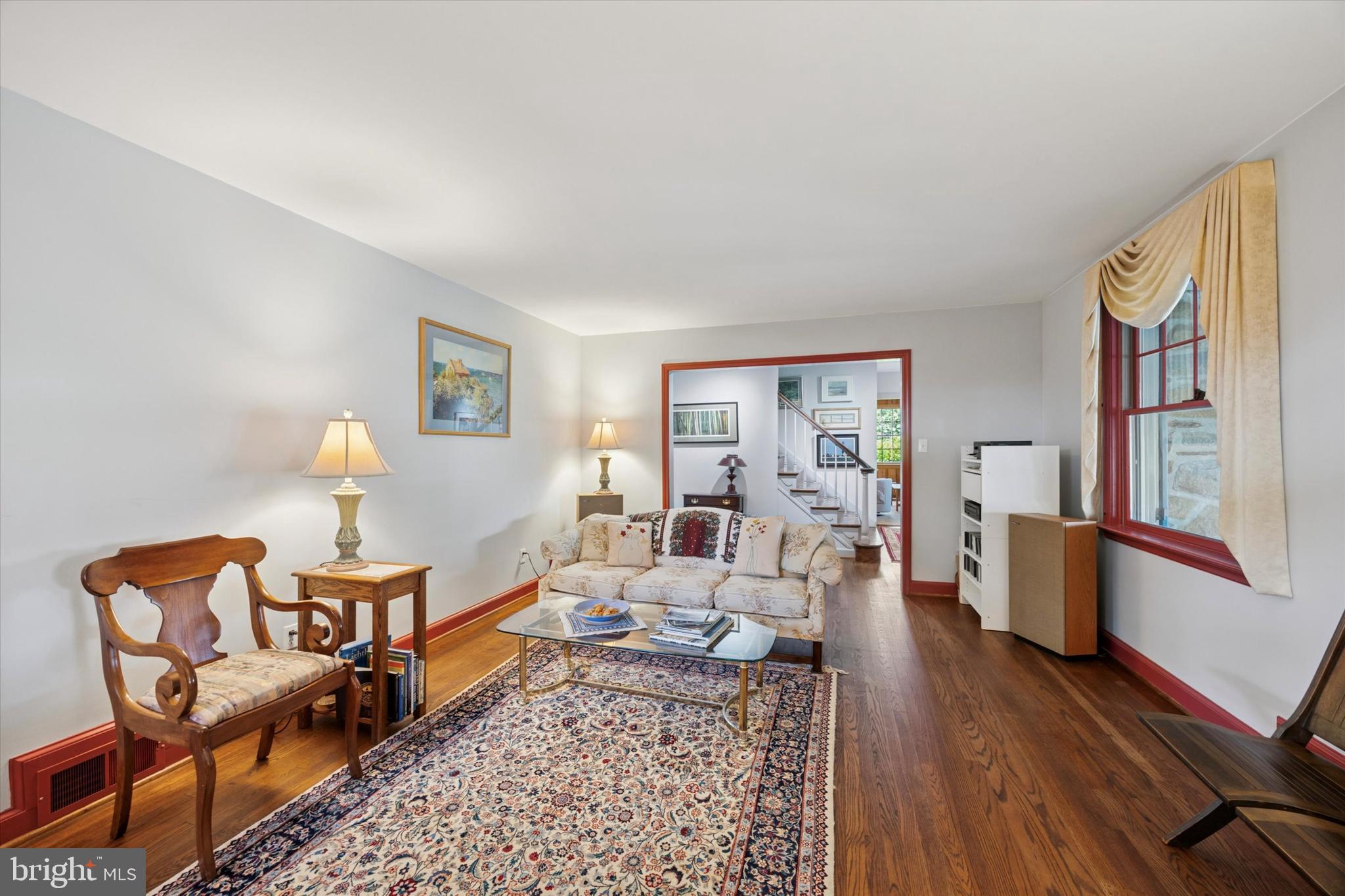 1208 Bruce Road Wilmington, DE 19803 - Photo 5 of 38 a living room with furniture fireplace and wooden floor