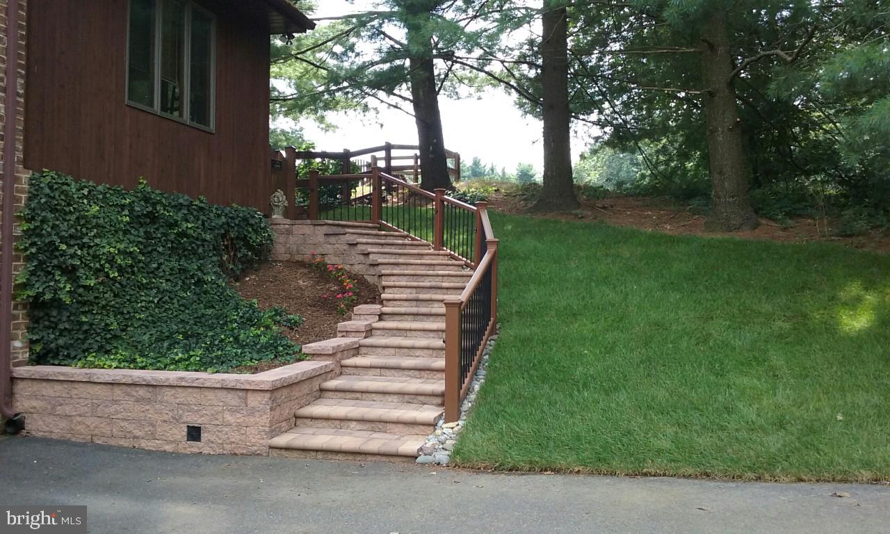 813 Thomas Run Road Bel Air, MD 21015 - Photo 3 of 5 Lighted, elevated hardscape steps to rear of home