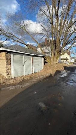 a view of a house with a snow in the yard