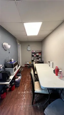 a room with furniture pool table gym equipment and a view of living room