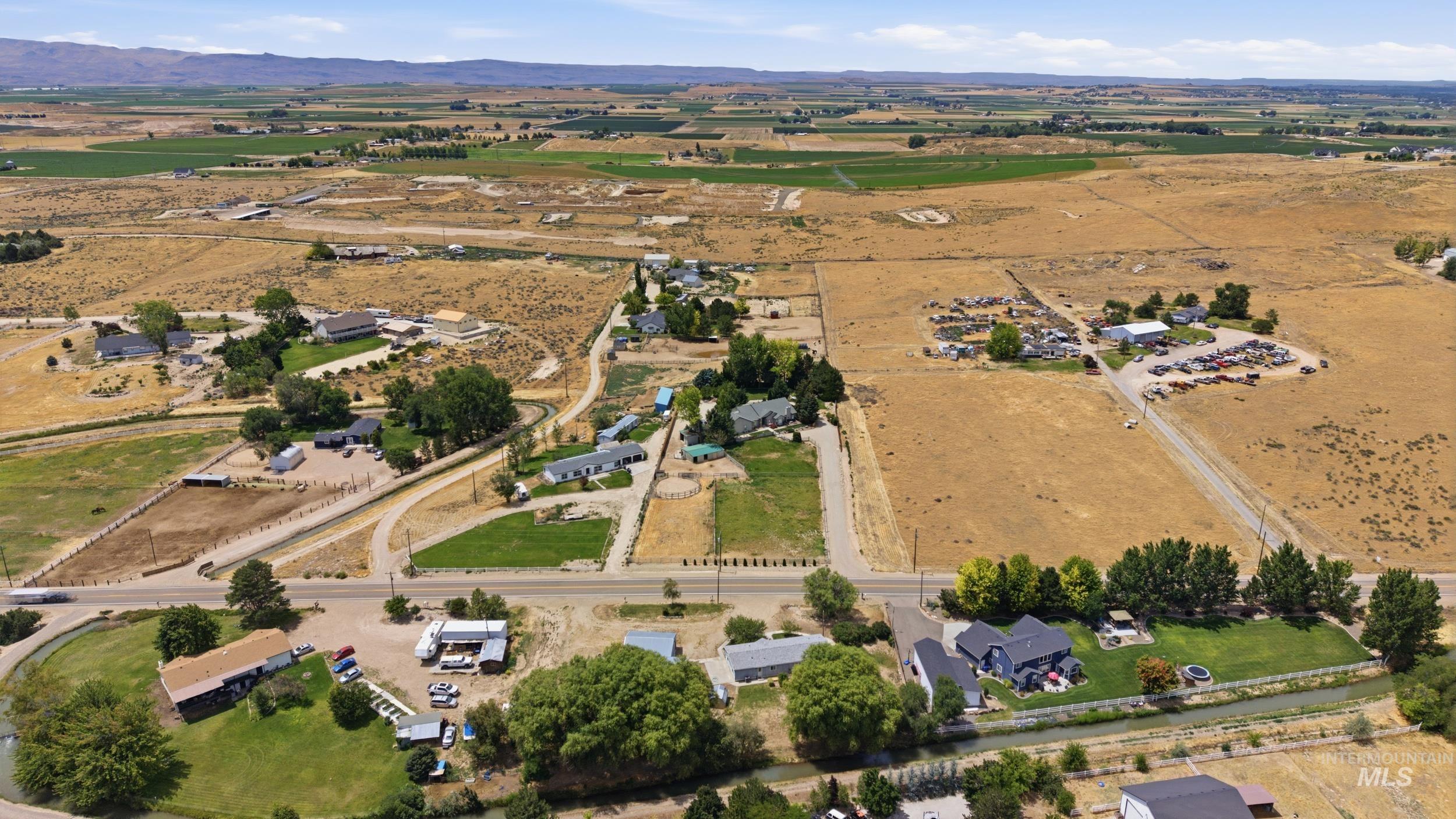 7422 Track Road Nampa, ID 83686 - Photo 42 of 50 Expansive aerial perspective showcasing a residential development amidst agricultural fields