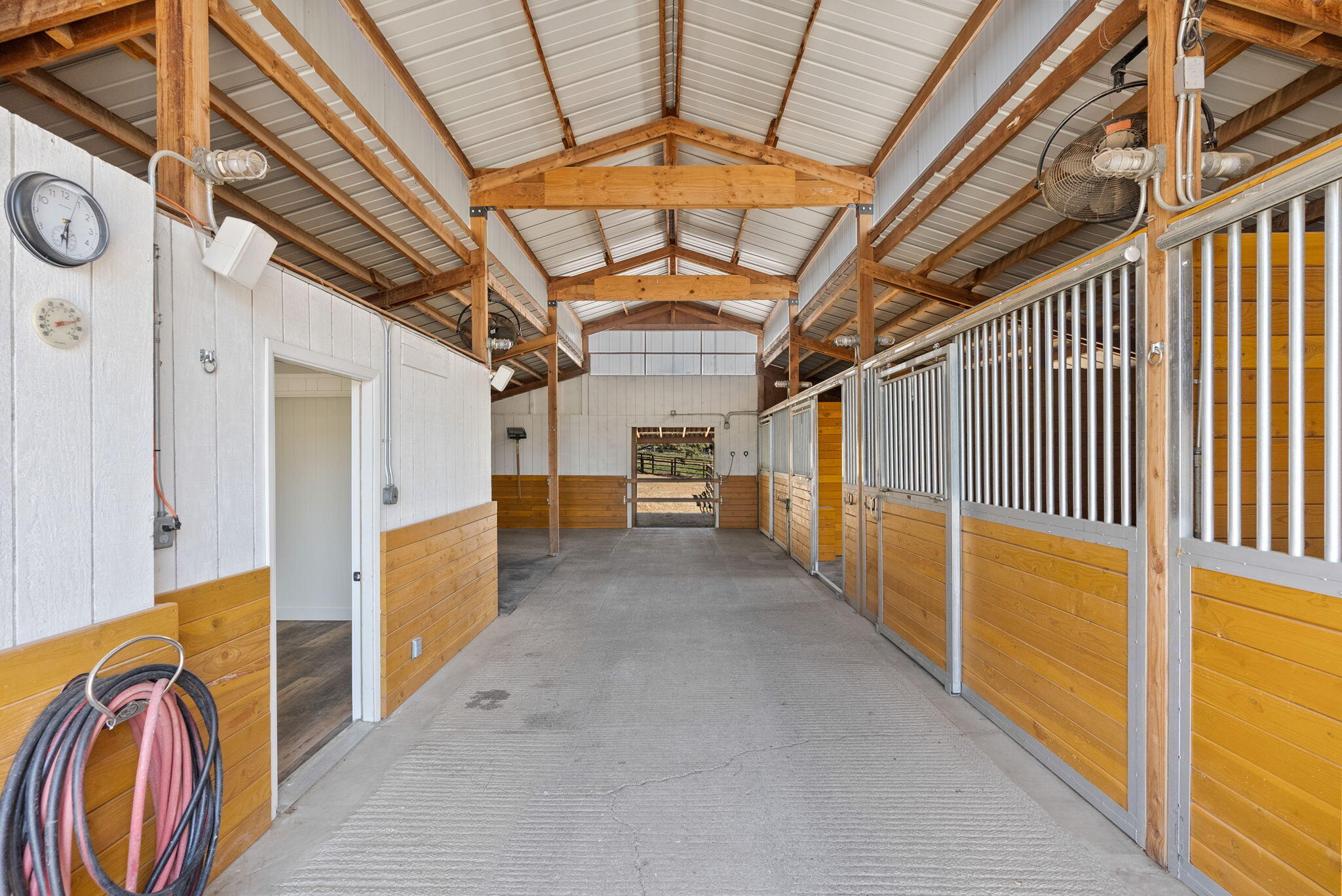 19395 Innes Market Road Bend, OR 97703 - Photo 4 of 75 Barn, heated tack room with full bathroom and shower!