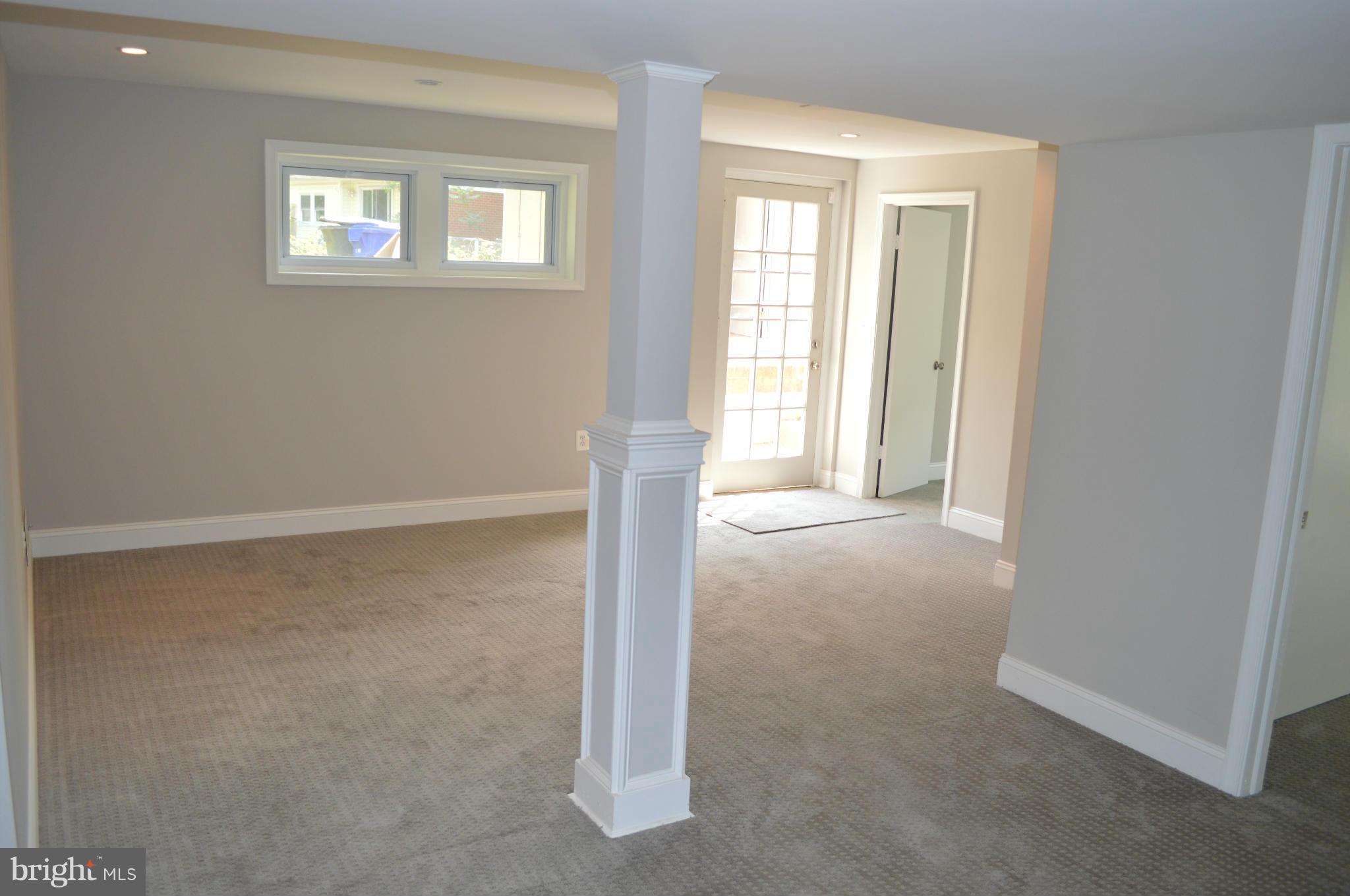 4238 Isbell Street Silver Spring, MD 20906 - Photo 16 of 22 a view of an empty room with a window
