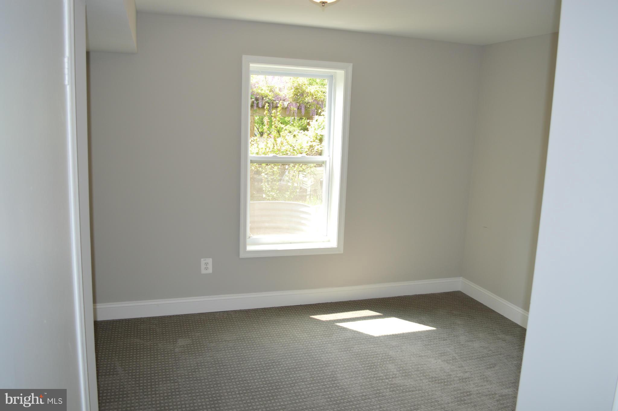 4238 Isbell Street Silver Spring, MD 20906 - Photo 18 of 22 an empty room with a window