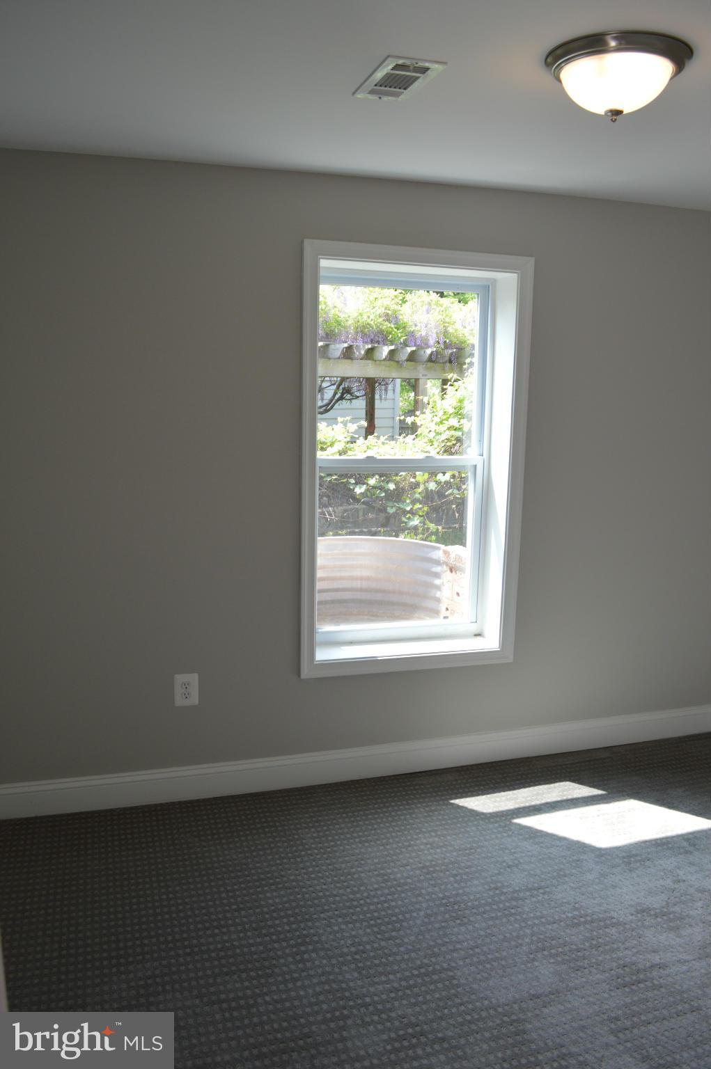 4238 Isbell Street Silver Spring, MD 20906 - Photo 19 of 22 an empty room with a window