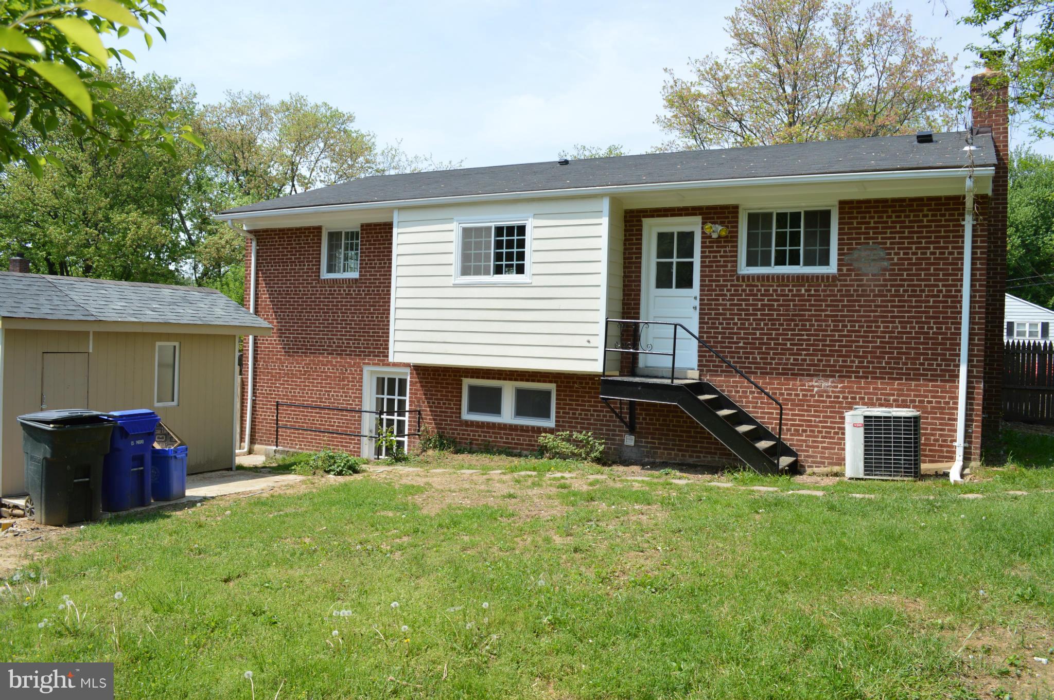 4238 Isbell Street Silver Spring, MD 20906 - Photo 22 of 22 a view of a house with backyard and porch