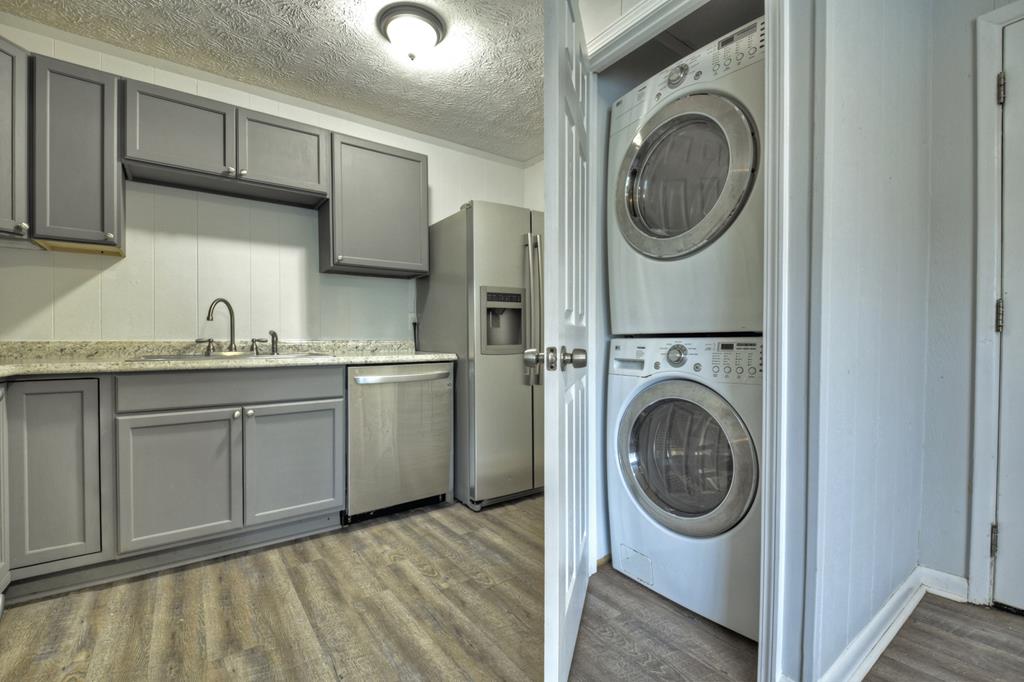 870-868 Sugar Creek Road Blue Ridge, GA 30513 - Photo 16 of 84 a utility room with sink dryer and washer