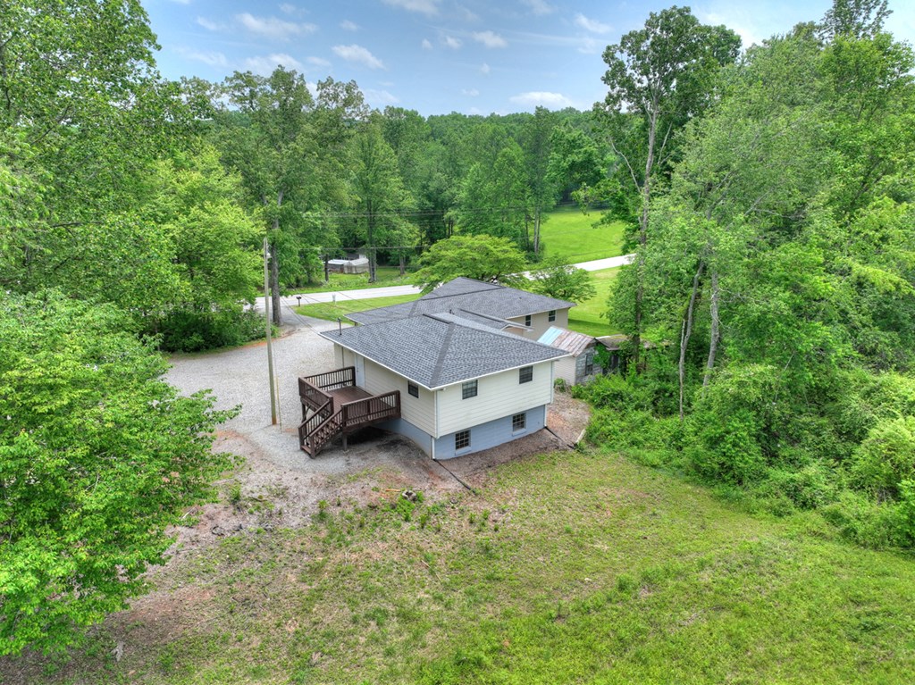 870-868 Sugar Creek Road Blue Ridge, GA 30513 - Photo 19 of 84 an aerial view of a house with yard and outdoor seating