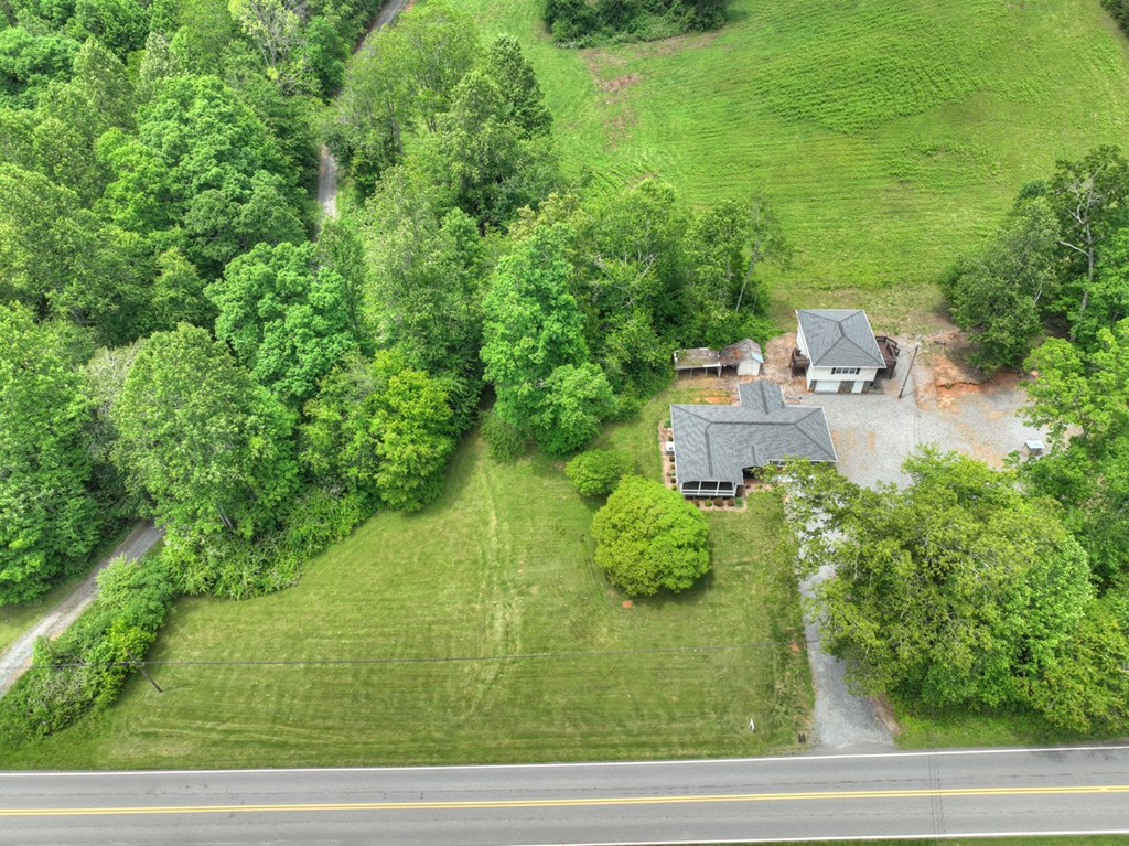 870-868 Sugar Creek Road Blue Ridge, GA 30513 - Photo 25 of 84 an aerial view of a house with a yard