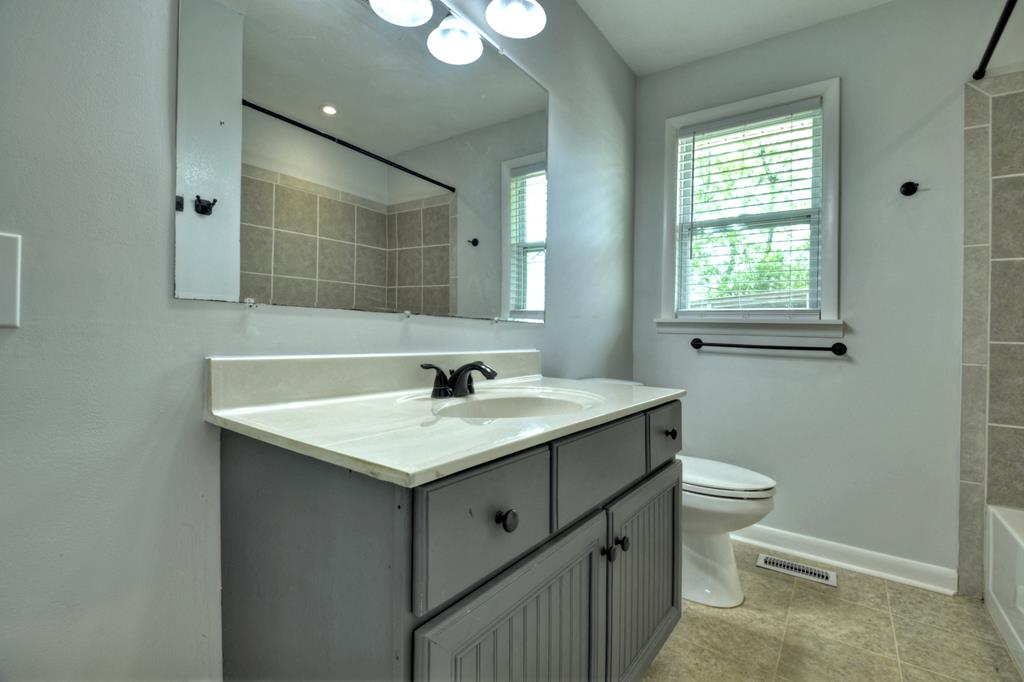 870-868 Sugar Creek Road Blue Ridge, GA 30513 - Photo 70 of 84 a bathroom with a sink and a toilet