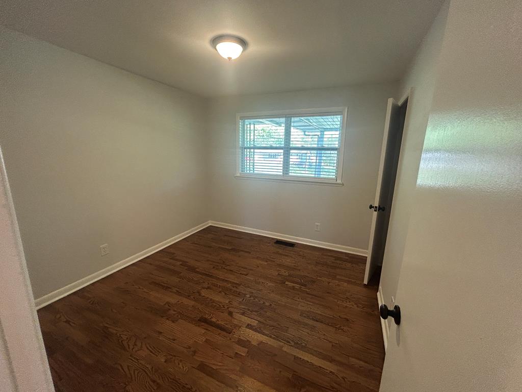 870-868 Sugar Creek Road Blue Ridge, GA 30513 - Photo 74 of 84 an empty room with wooden floor and windows