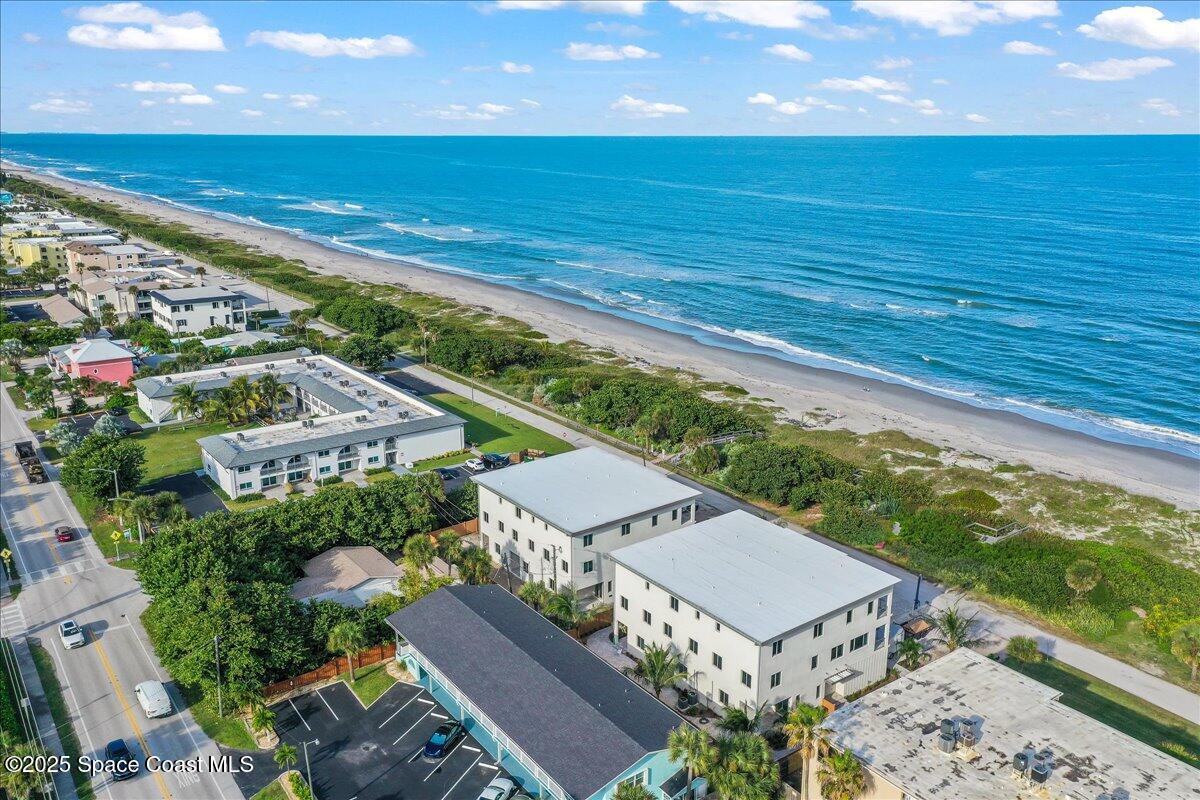 1004 Wave Crest Avenue Indialantic, FL 32903 - Photo 1 of 51 a view of a city from a terrace