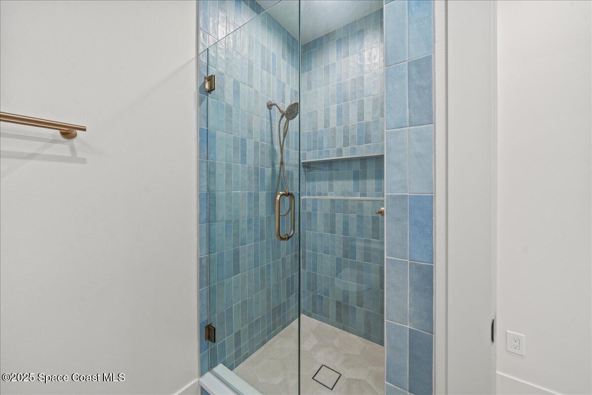 1004 Wave Crest Avenue Indialantic, FL 32903 - Photo 18 of 51 a bathroom with a shower