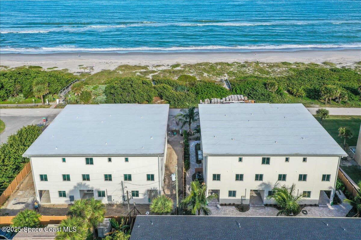 1004 Wave Crest Avenue Indialantic, FL 32903 - Photo 2 of 51 a view of a building with an outdoor space