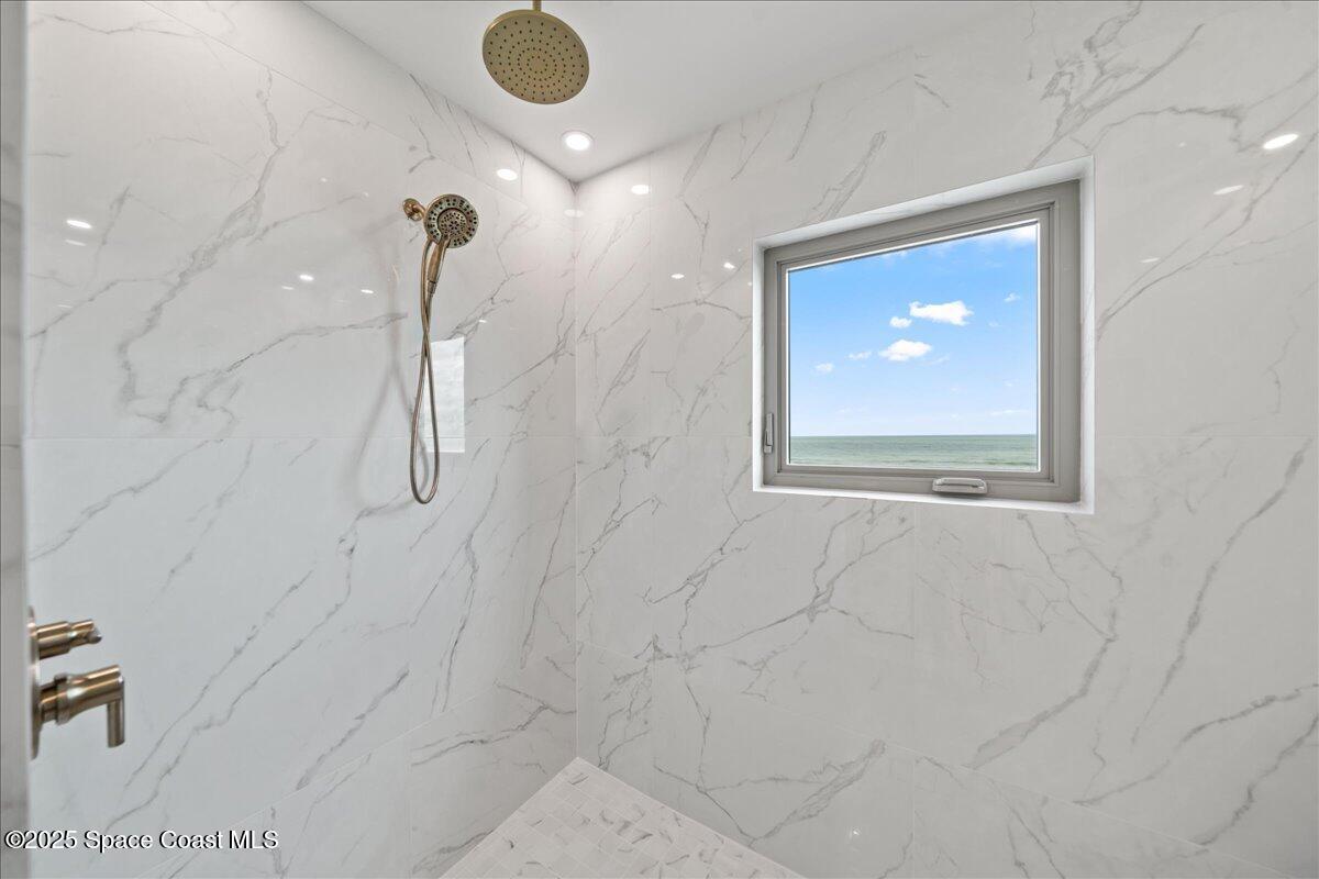 1004 Wave Crest Avenue Indialantic, FL 32903 - Photo 29 of 51 a bathroom with a shower