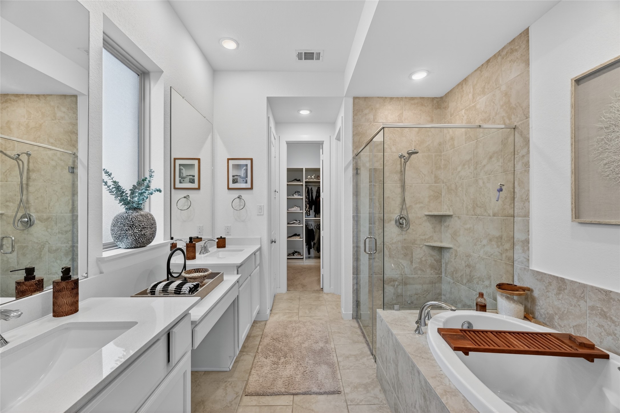 4439 Stone Ridge Lane Manvel, TX 77578 - Photo 26 of 48 a large bathroom with a tub sink shower and mirror