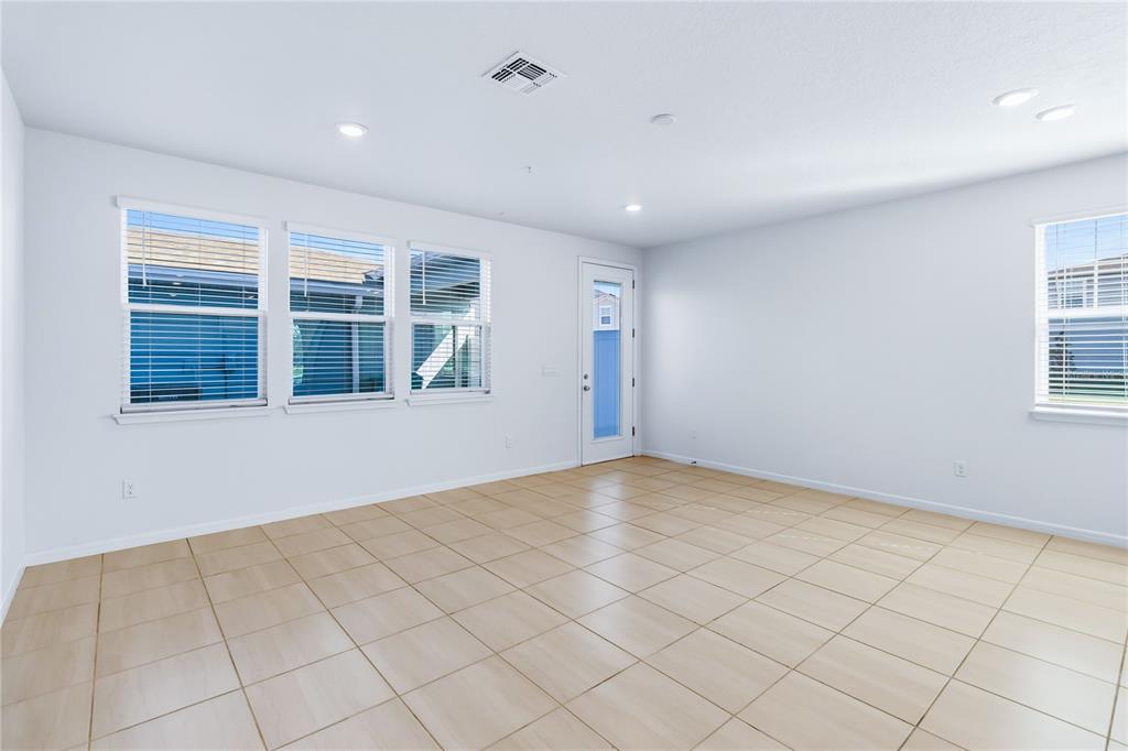 10379 Folly Beach Road Orlando, FL 32827 - Photo 22 of 54 a view of an empty room