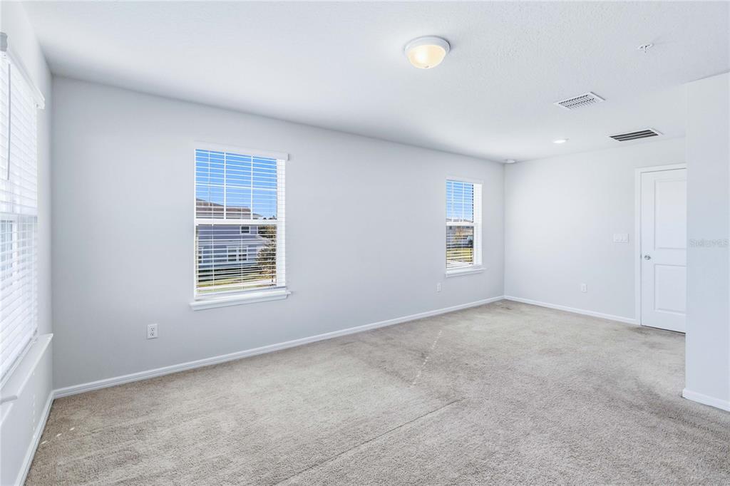 10379 Folly Beach Road Orlando, FL 32827 - Photo 30 of 56 an empty room with a window