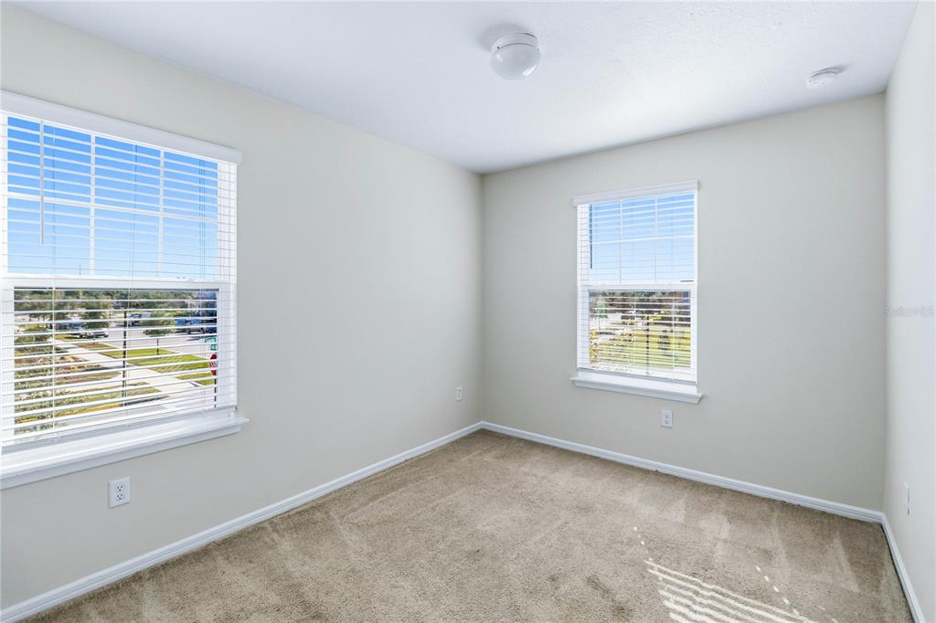 10379 Folly Beach Road Orlando, FL 32827 - Photo 34 of 56 an empty room with a window